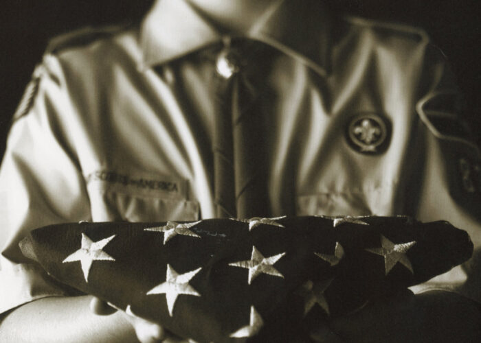 Boy Scout Holding American Flag