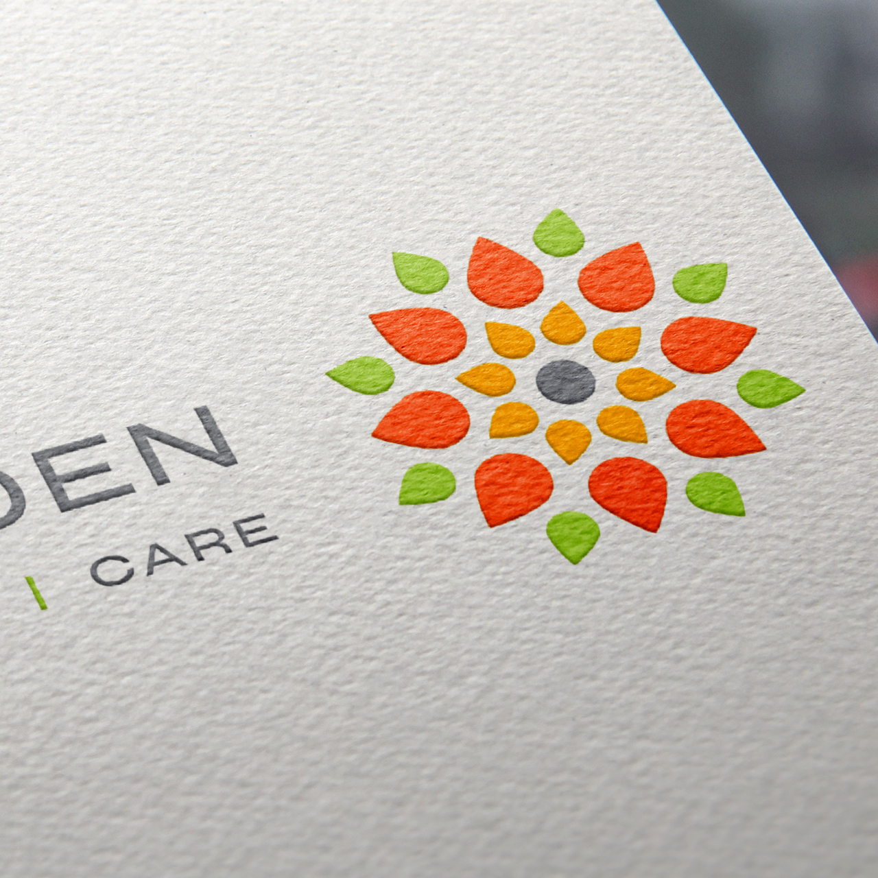 A close-up image of the Outside Garden logo printed on letterhead