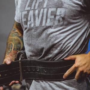 An image of a man with a weight lifting belt around his waist