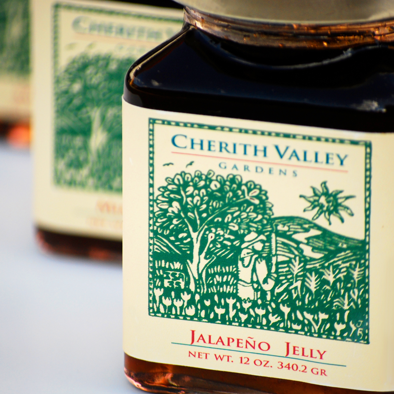 An image of a jar of Cherith Valley Gardens Jalapeño Jelly package design
