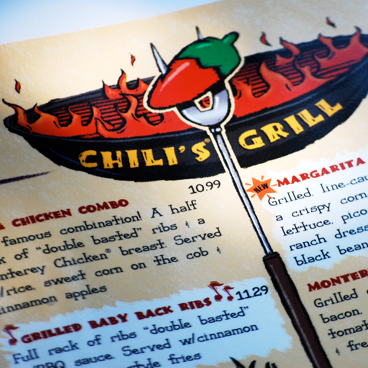 An image of the Chili's Grill logo design on the interior of the Chili's menu