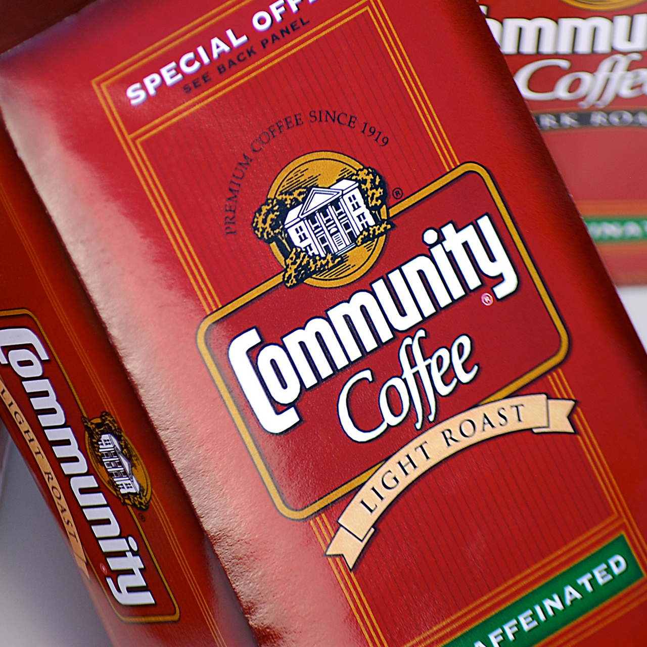 An image of the front of Community Coffee's package Design for Light Roast Decaffeinated Coffee