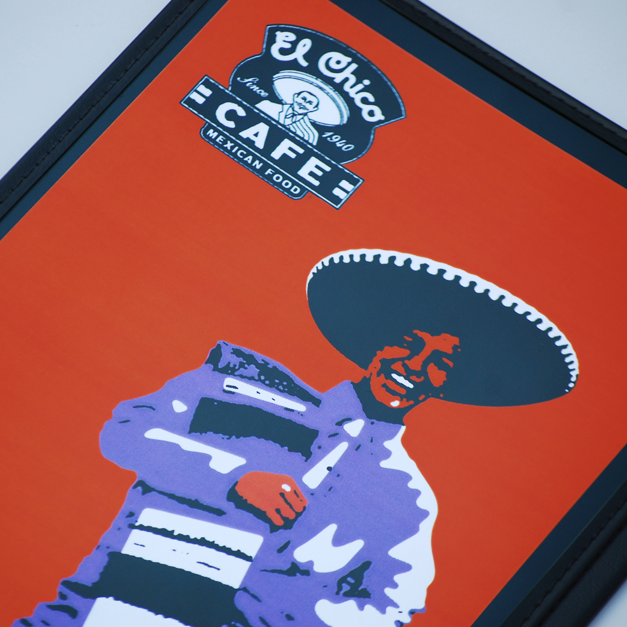 An image of the cover design for the El Chico menu