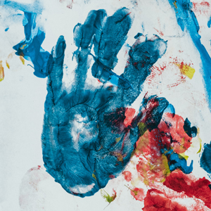 An image of a kid's hand print in blue paint