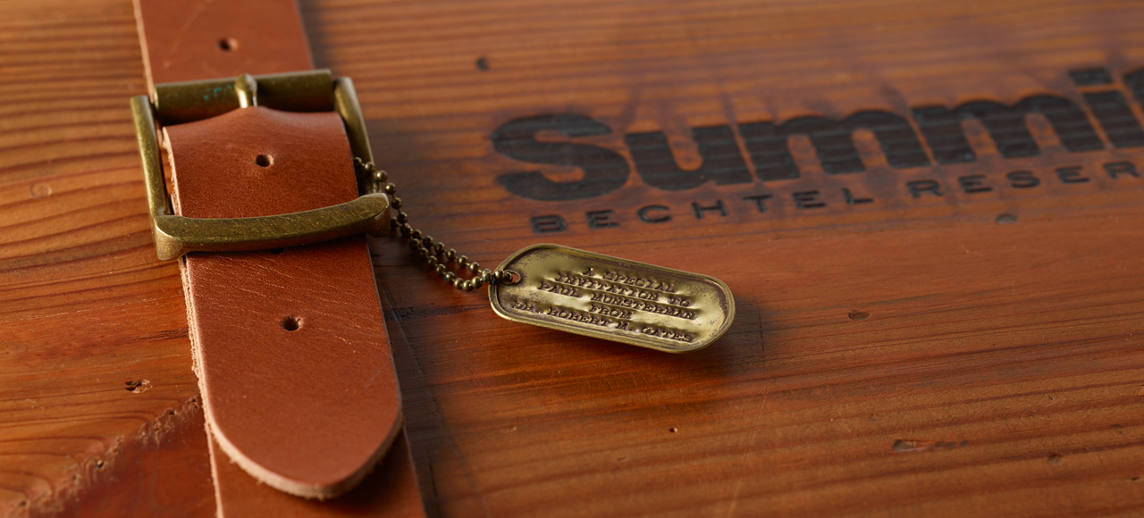 An image of the outside of a wooden gift box with the Summit Bechtel Reserve logo branded into the top surface