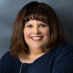 A portrait of Amy Fry, Marketing Director