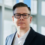 A portrait of Danial Tutle, Marketing Director
