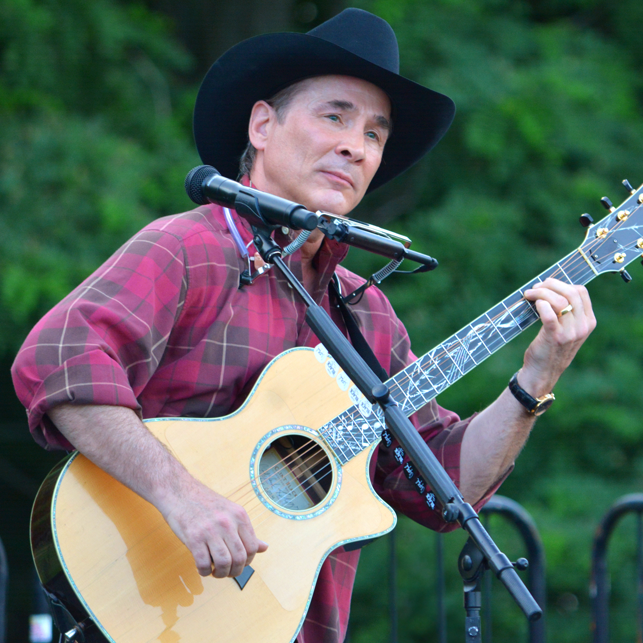 Image of Clint Black playing guitar