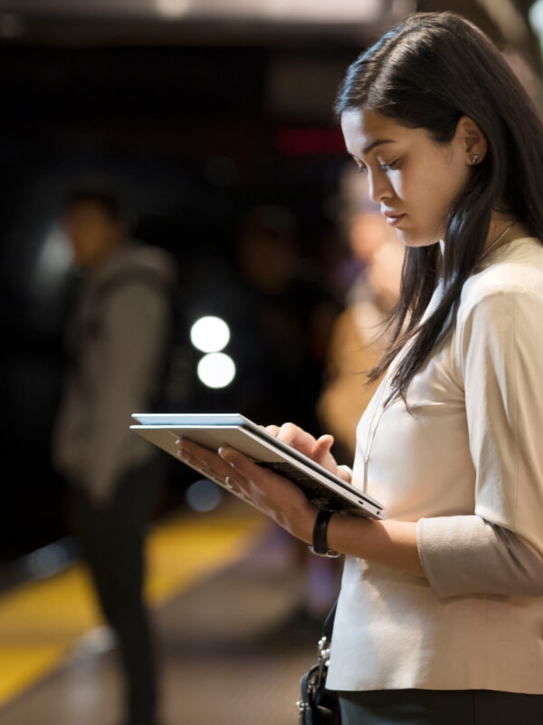Girl holding HP laptop