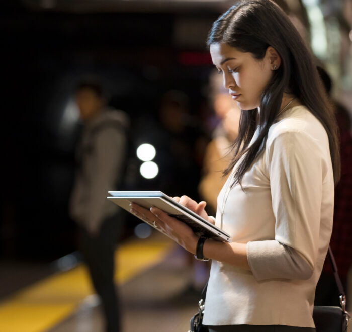 Girl holding HP laptop